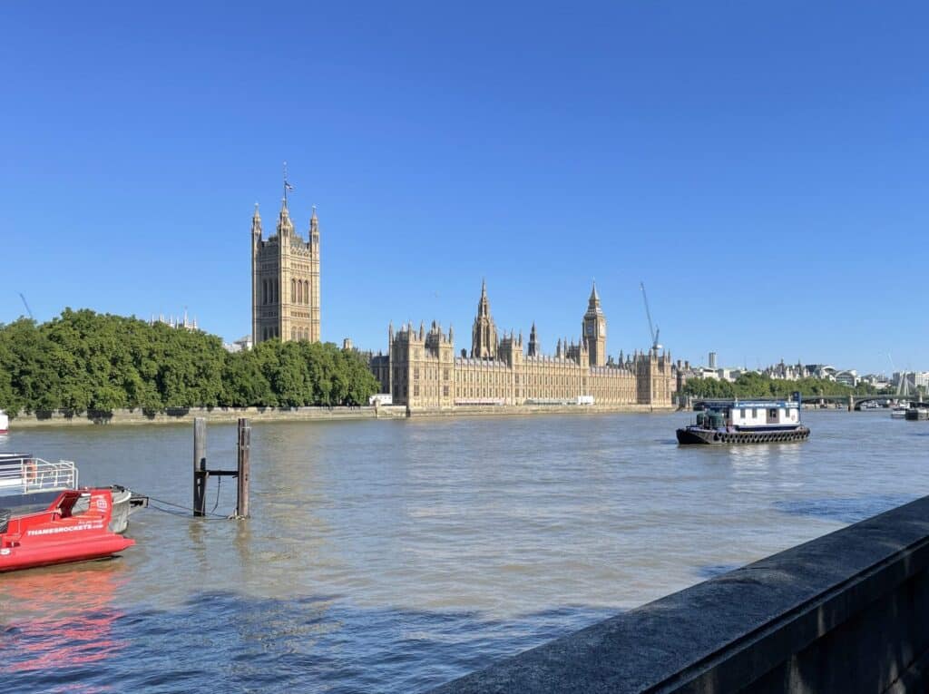 View of the Houses of Parliament and Big Ben across the River Thames on a clear day